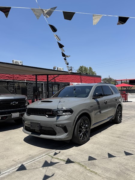 Hand detailing a vehicle at Miracle Mile