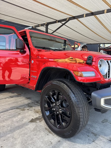 Gleaming vehicle after premium hand wash detail